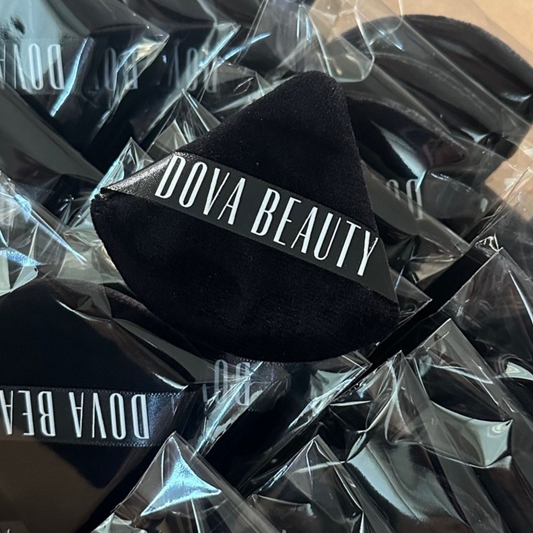 Black powder puff with logo